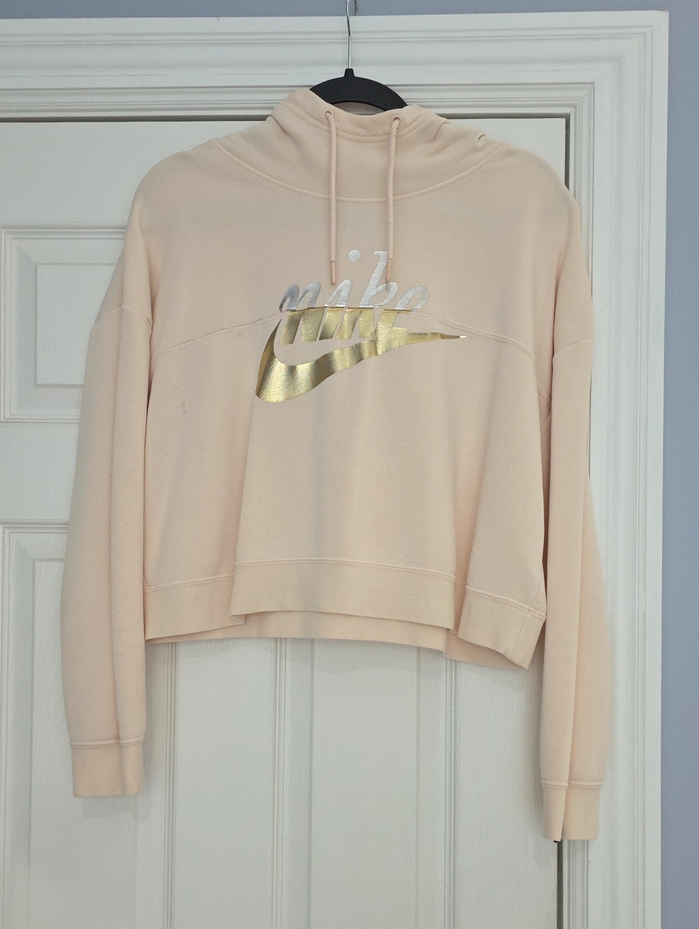 Nike Women’s Cropped Hoodie in Pale Peach with Gold Swoosh